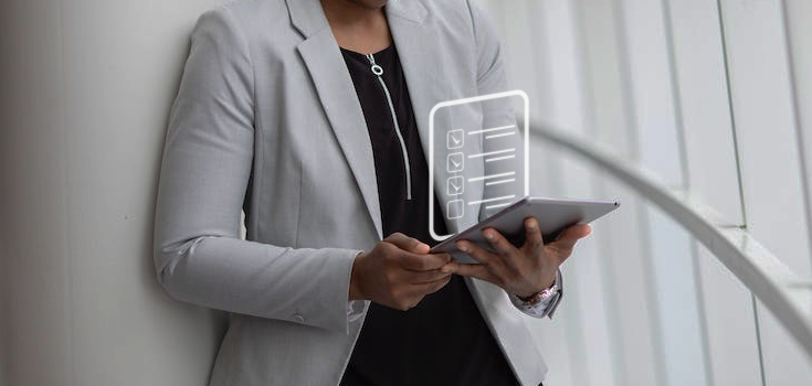 Employee holding a tablet