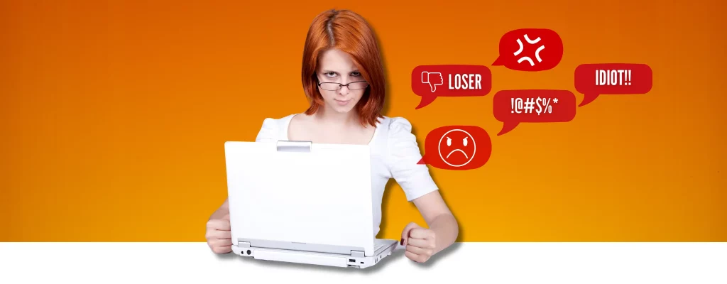 angry woman in front of a laptop