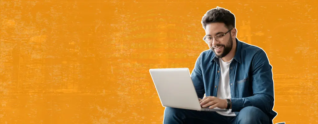 A smiling computer user enjoying online freedom and digital rights