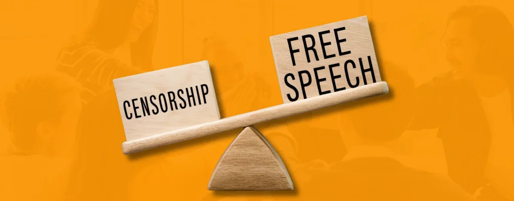 A wooden weighing scale finding the balance between free speech and censorship